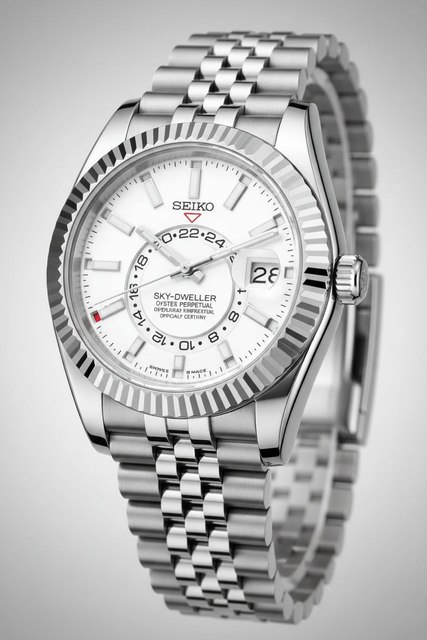 Silver Seiko watch with a white face on a black background