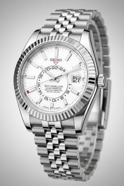 Silver Seiko watch with a white face on a black background