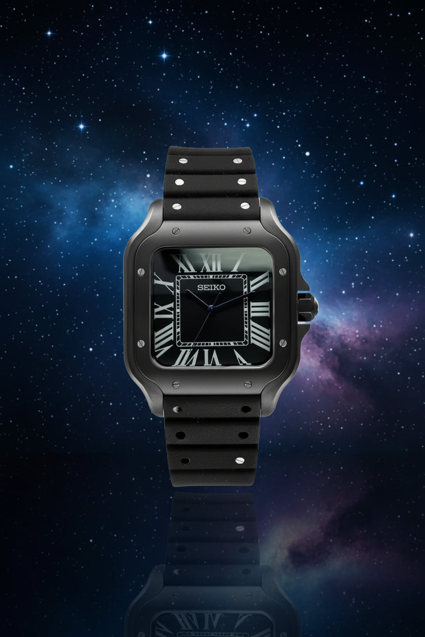 Black Seiko watch with a square face and rubber strap on a white background