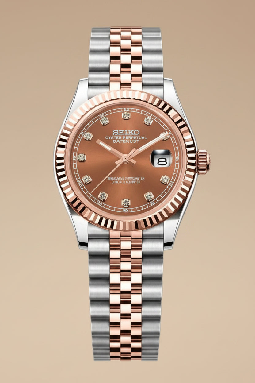 A Seiko watch with a two-tone stainless steel and rose gold Jubilee bracelet, featuring a rose gold dial with diamond hour markers and a fluted bezel, shown against a plain white background.
