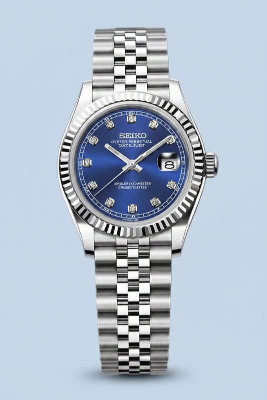 A Seiko watch with a stainless steel Oyster bracelet and a blue dial, shown against a plain white background.