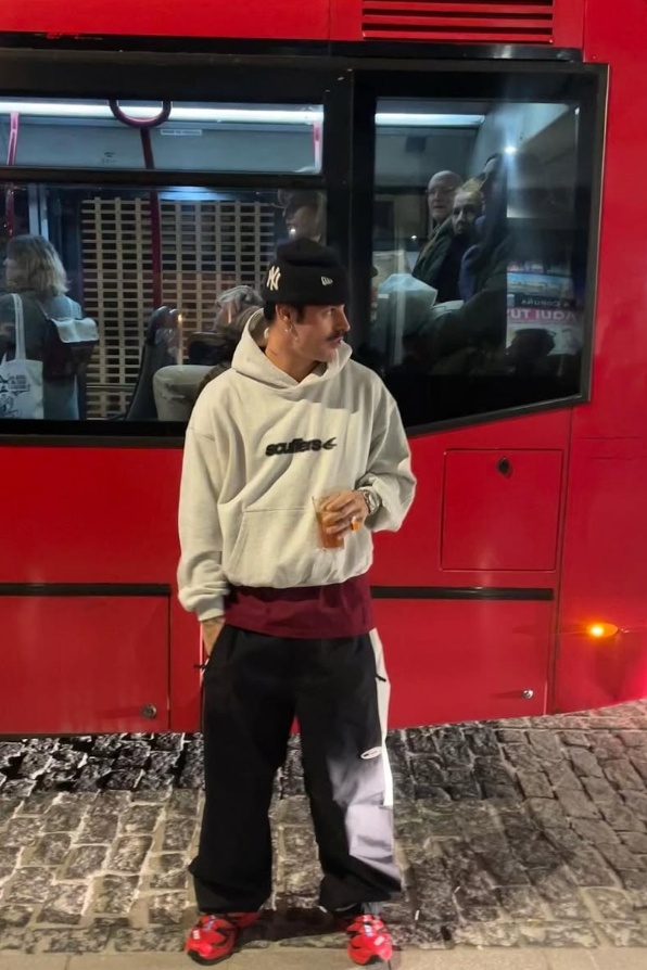 man standing in front of bus with seiko mod