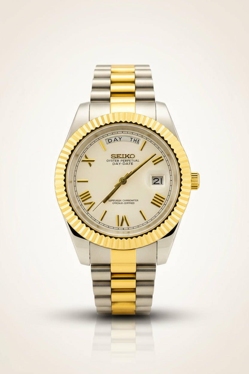 A Seiko Oyster Perpetual watch with a two-tone gold and silver stainless steel bracelet and fluted bezel, displayed inside a gold velvet watch box.